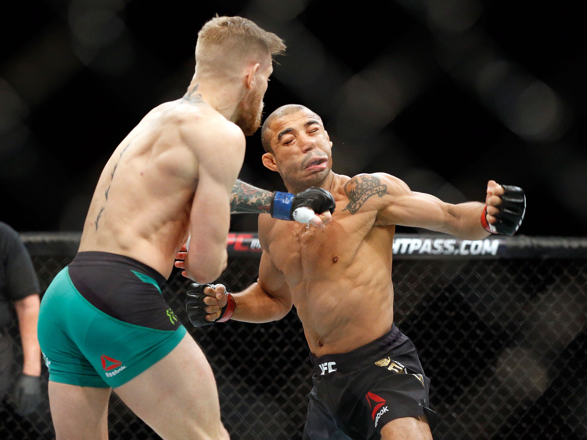 Conor McGregor knocks out Jose Aldo at UFC 194