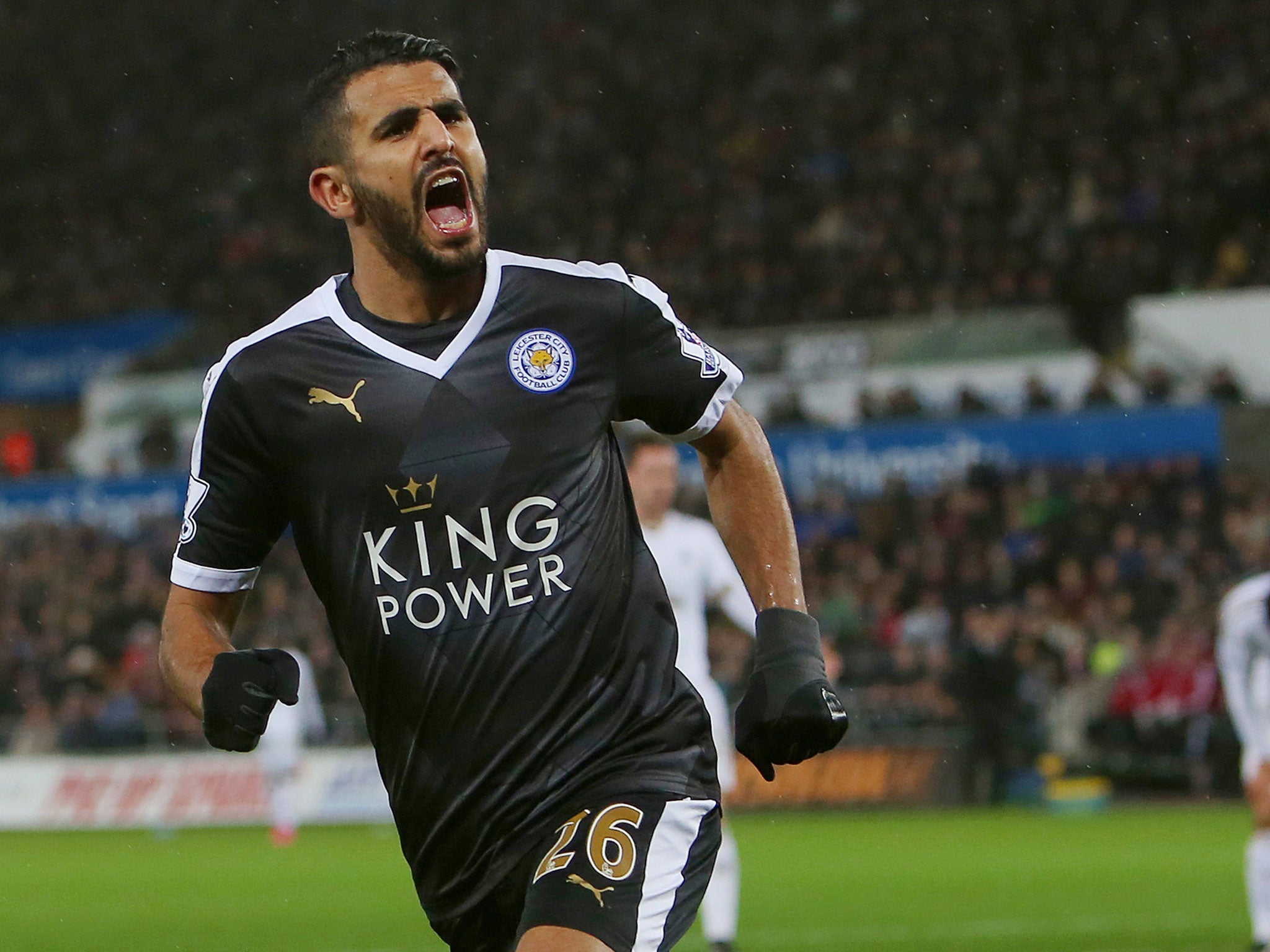 Riyad Mahrez celebrates scoring a goal for Leicester
