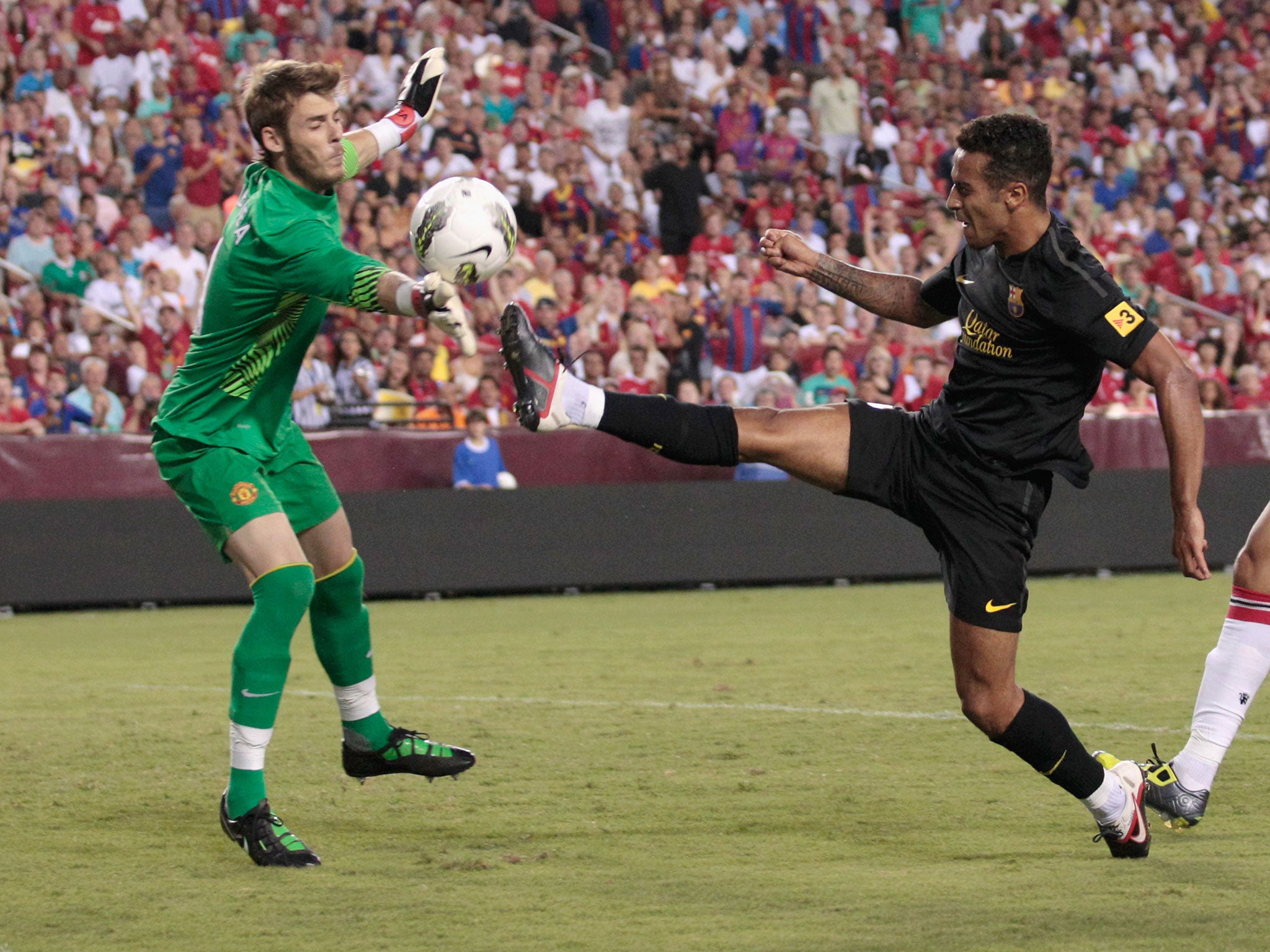 &#13;
De Gea (left) attempted to talk Thiago (right) into joining United&#13;