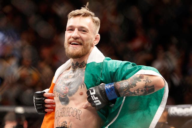 Conor McGregor celebrates his UFC 194 victory over Jose Aldo
