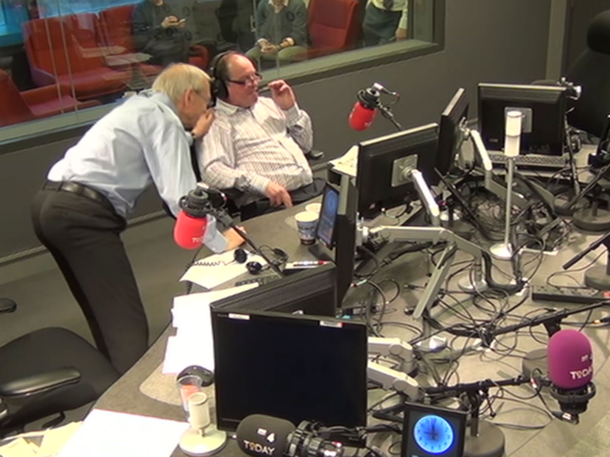 John Humphrys pats James Naughtie on the shoulder after his emotional farewell