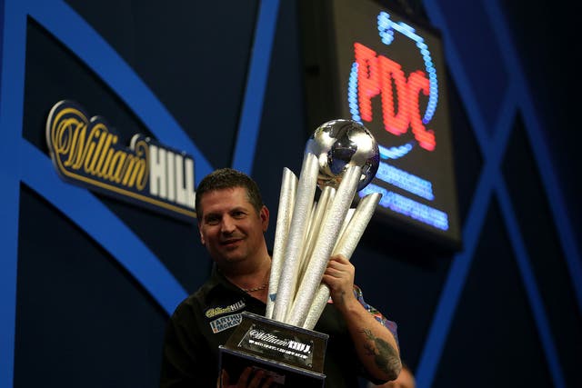 Gary Anderson celebrates after winning the 2015 Darts World Championship