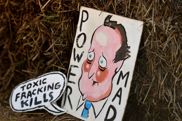 A placard depicting David Cameron at anti-fracking protest in Balcombe last year