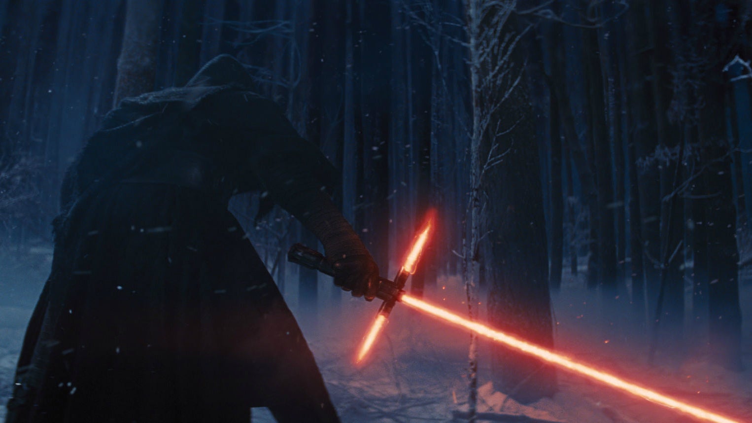 Kylo Ren ignites his lightsaber in Star Wars: The Force Awakens