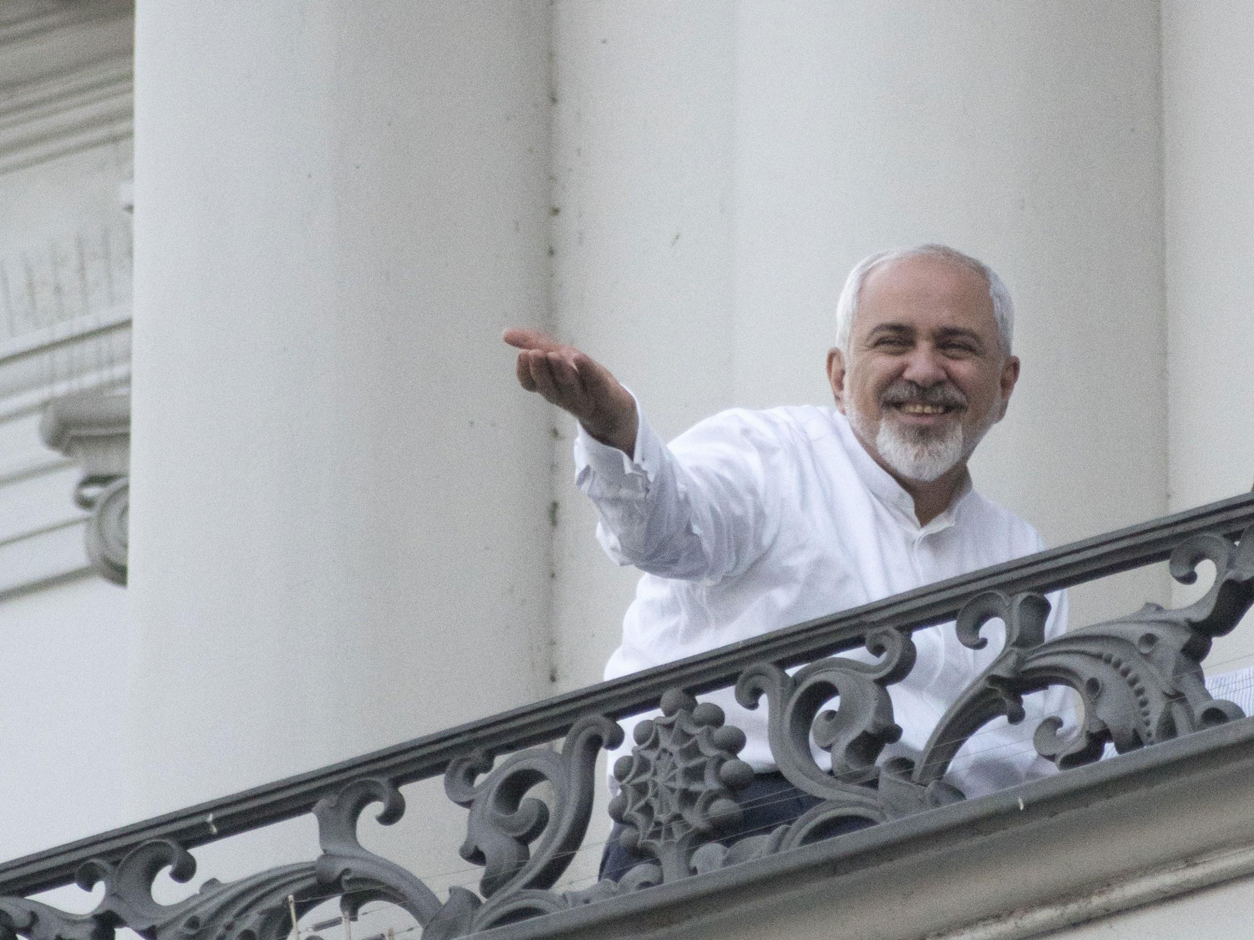 Iranian Foreign Minister Javad Zarif stands on the balcony of Palais Coburg in Vienna, the venue for nuclear talks