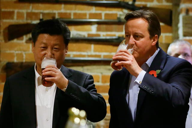 <p>Golden years: in 2015, China’s Xi Jinping had a pint with David Cameron at a pub near Chequers</p>
