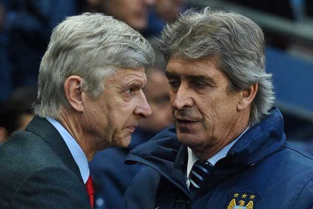 Arsenal manager Arsene Wenger and Manchester City manager Manuel Pellegrini