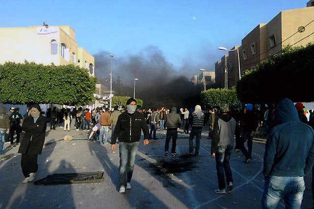 Protestors clash with security forces in 2010, days after Mohammed Bouazizi's death