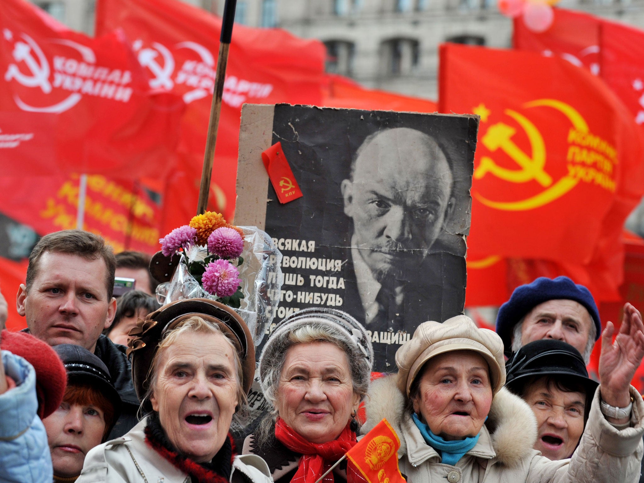 Activists of the Communist party gather during a rally on Independence Square in Kiev on 7 November, 2010