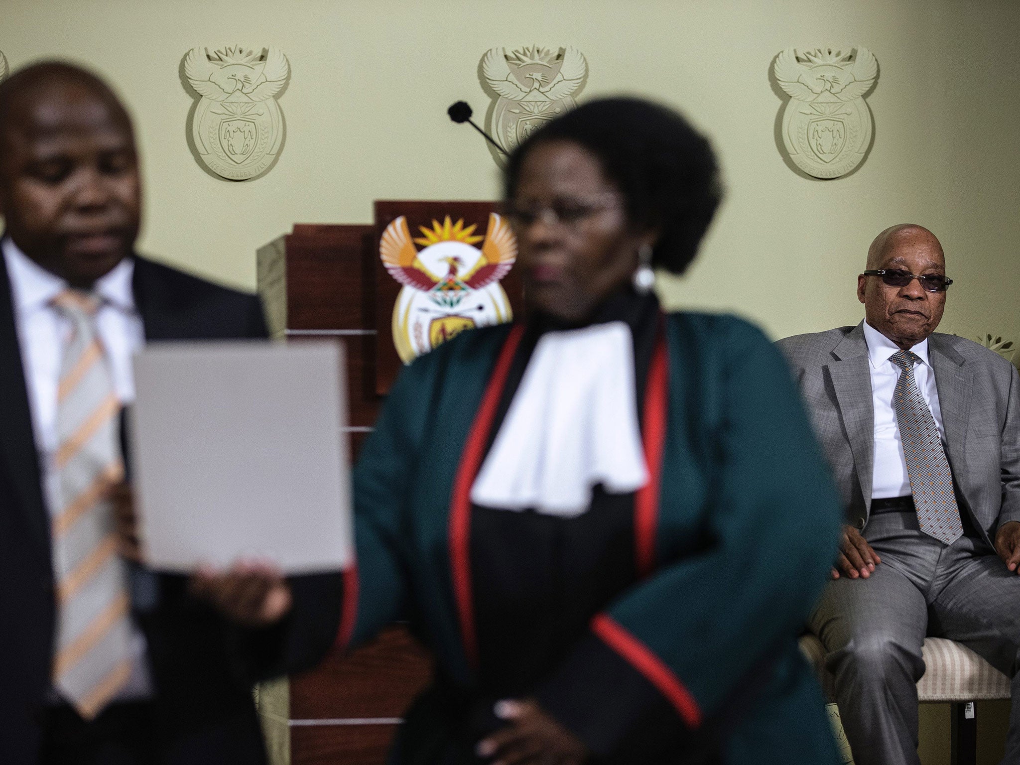 Jacob Zuma, far right, looks on as the new Finance Minister David van Rooyen was sworn in; he was replaced by Pravin Gordhan after five days