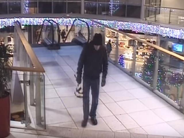 Police want to speak to this man after an improvised incendiary device was planted in a shopping centre in Preston