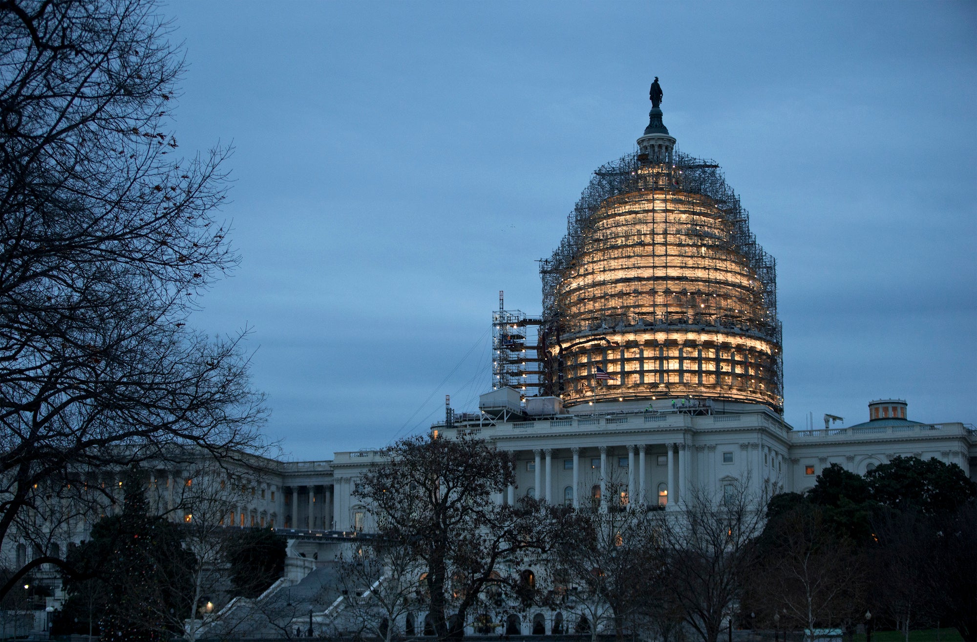 The House and Senate wrap up votes on a spending and tax package in which President Barack Obama has promised to sign.