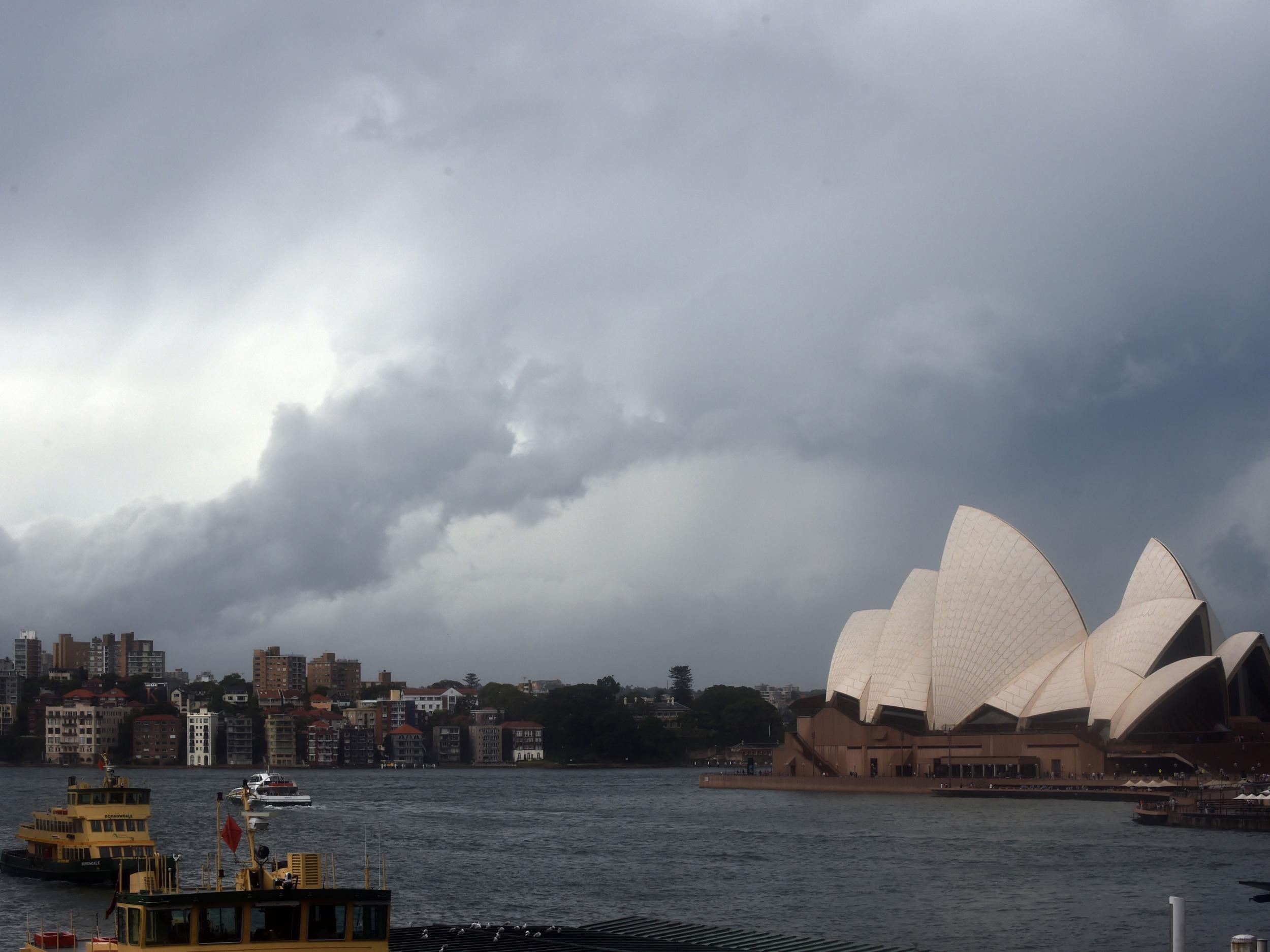 Storm clouds gather over Sydney Harbour in Sydney
