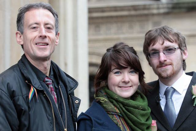 Heterosexual couple, Ian Goggin and Kristin Skarsholt pose with Peter Tatchell, after being refused a civil partnership