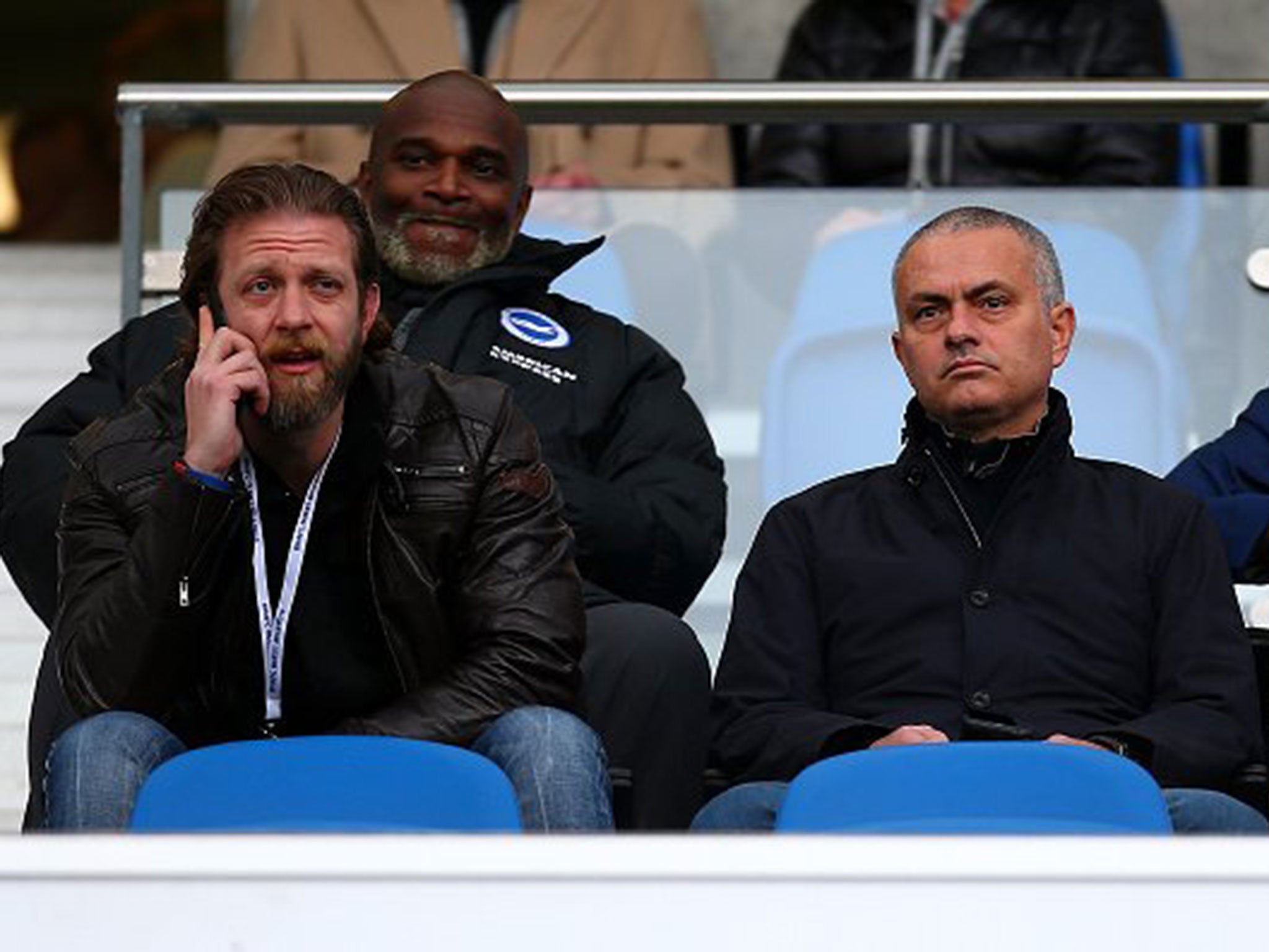 Jose Mourinho sits in the stands at Brighton's Amex Stadium