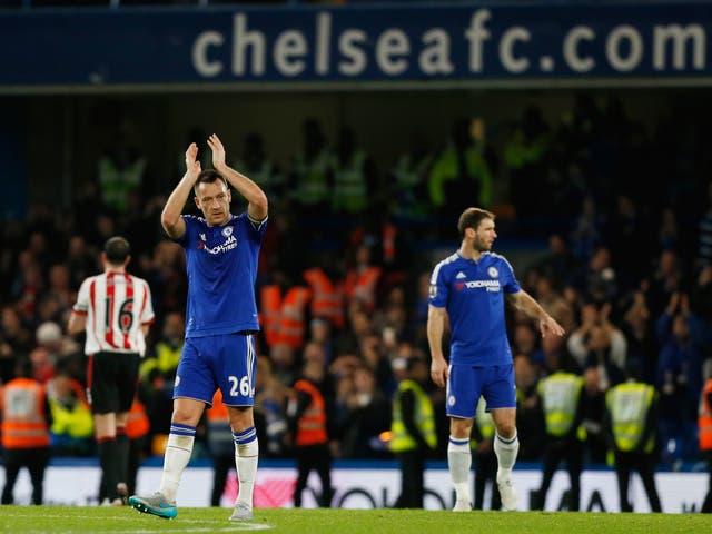 Terry acknowledges the fans at Stamford Bridge