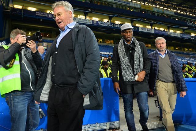 &#13;
Guus Hiddink, Didier Drogba and Roman Abramovich took a tour of the pitch after the win&#13;
