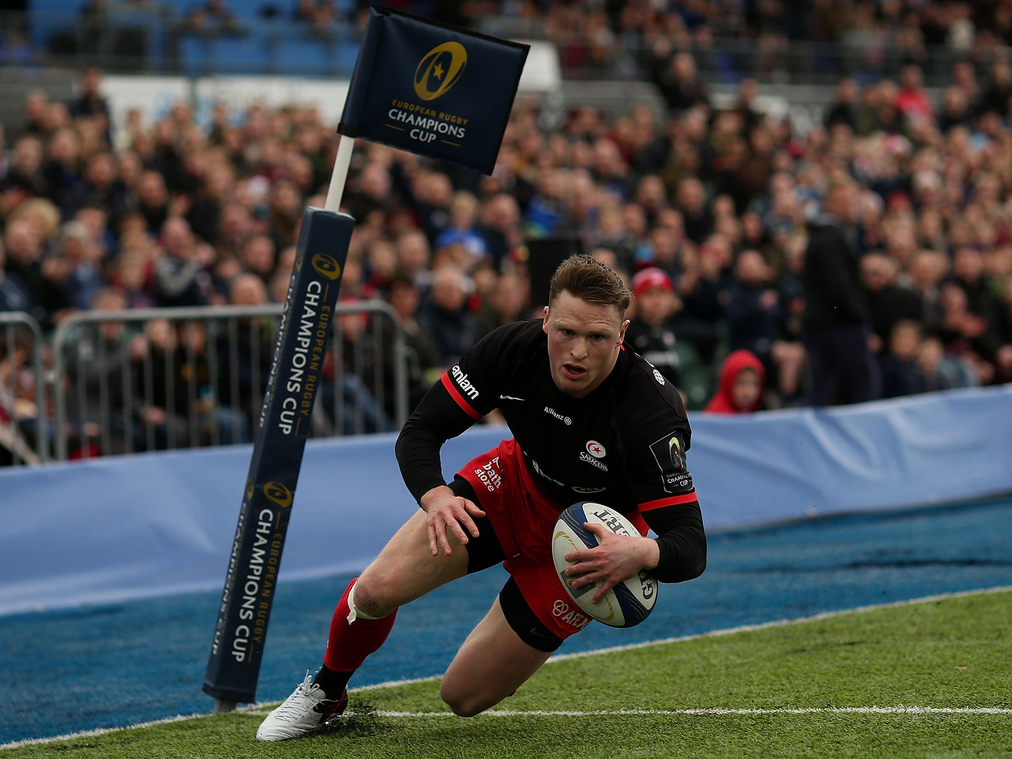 Chris Ashton dives over for one of his three tries for Saracens