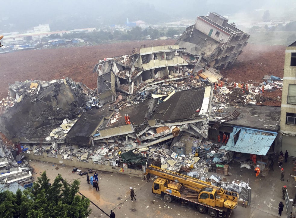 China landslide Dozens missing as dirt buries buildings in Shenzhen and 900 people are