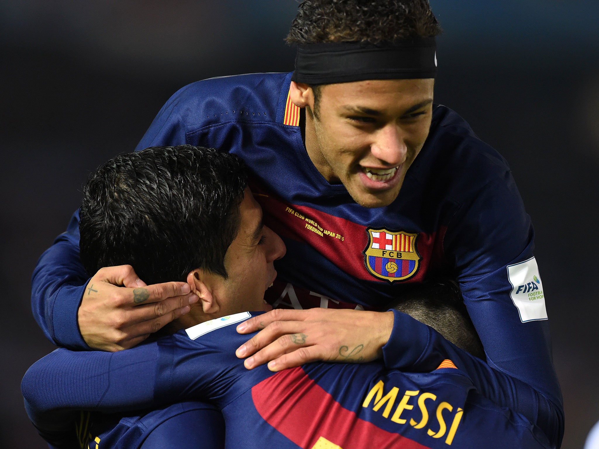 Lionel Messi, Luis Suarez and Neymar celebrate during the Club World Cup