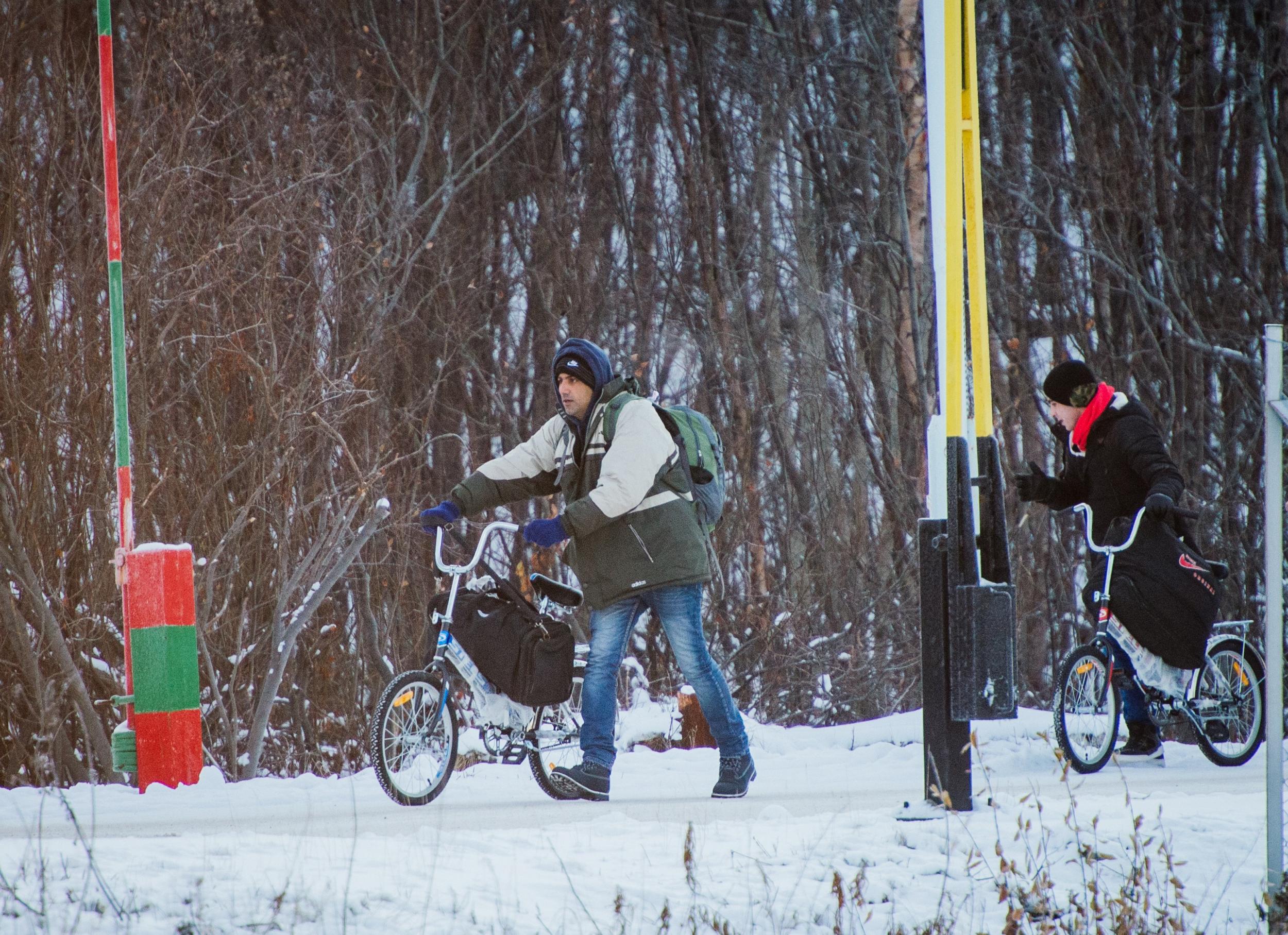 A refugee crosses into Norway from Russia