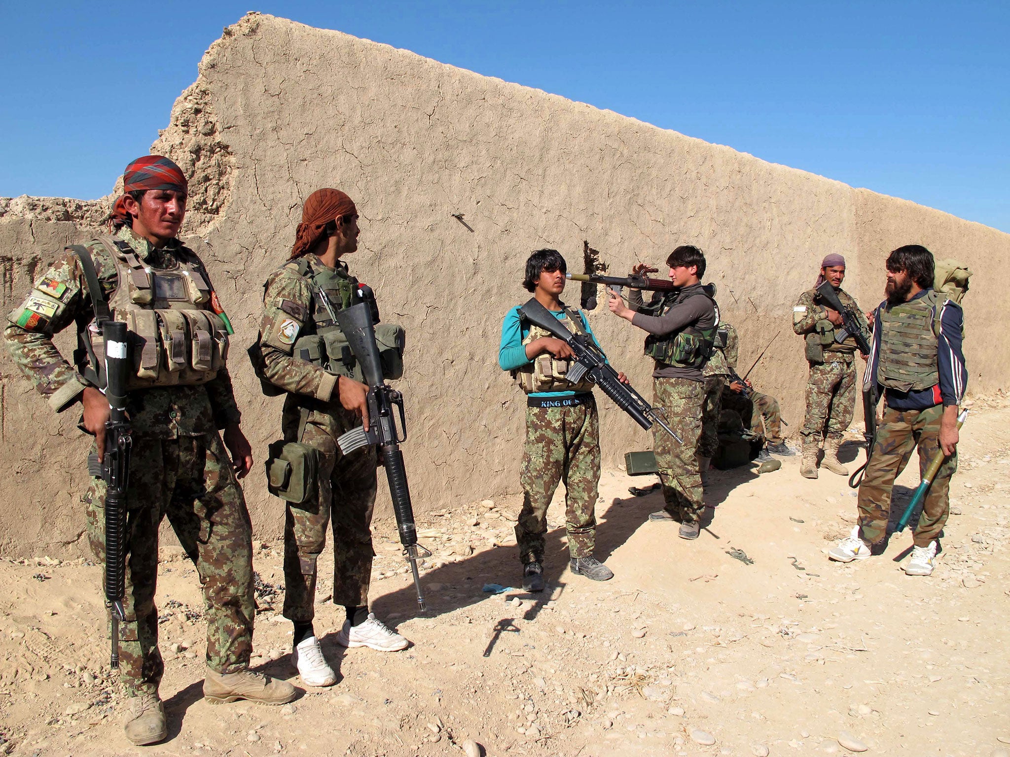 Afghan security forces patrol in Helmand province, Afghanistan