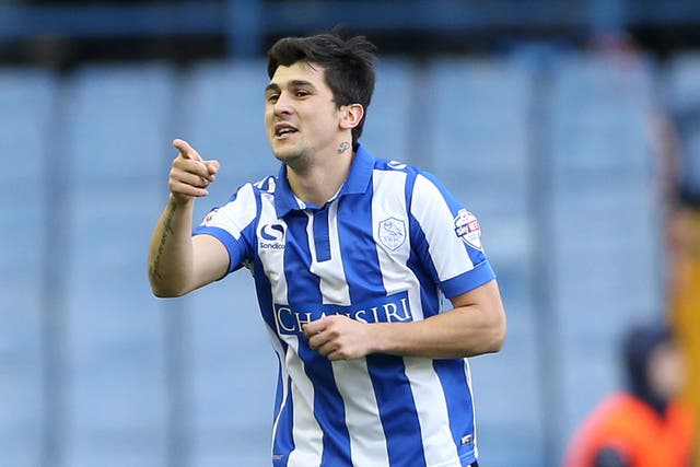 Fernando Forestieri celebrates getting Sheffield Wednesday’s equaliser, the first of his two goals in a 4-1 win