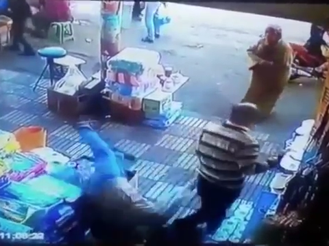 Chilling moment woman is knocked unconscious by a man during a