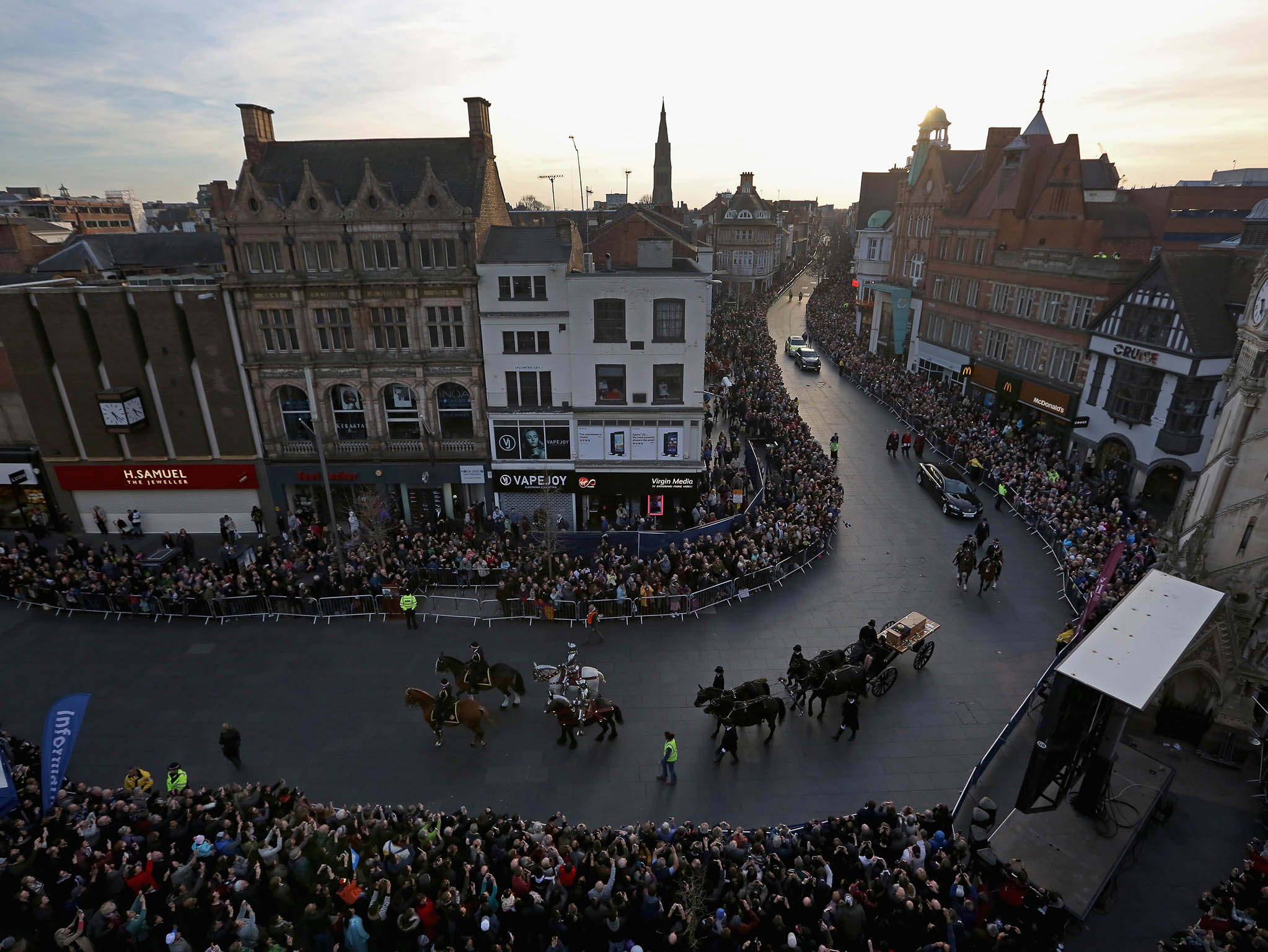 The coffin containing the remains of King Richard III is carried in procession for interment at Leicester Cathedra