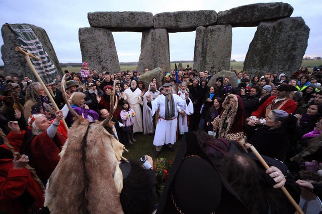 Druids and pagans take part in a Winter Solstice ceremony at Stonehenge in 2011