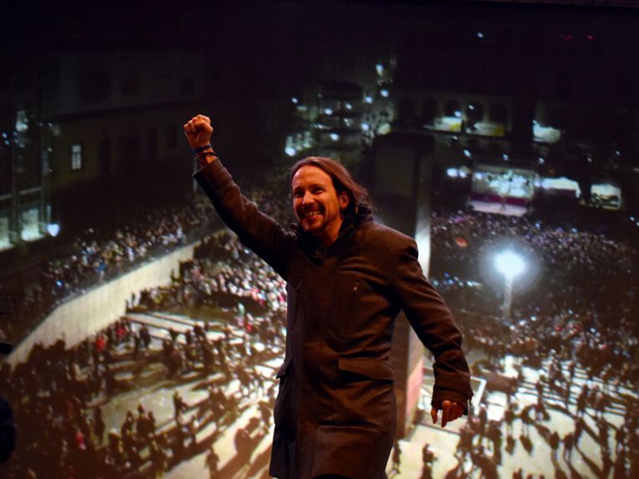 The Podemos leader, Pablo Iglesias, celebrating the results of the general elections in which the party won 69 seats in congress, ensuring the ruling PP no longer forms a majority