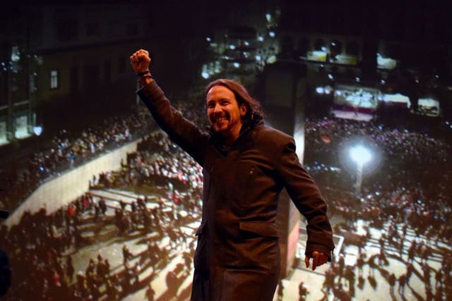 The Podemos leader, Pablo Iglesias, celebrating the results of the general elections in which the party won 69 seats in congress, ensuring the ruling PP no longer forms a majority