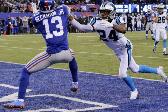 Odell Beckham Jr, of the New York Giants, was involved in a series of confrontations with Carolina’s Josh Norman, right, at the weekend. Beckham was later banned for one game by the NFL