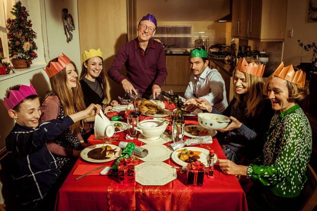 The time-travelling Robshaw family enjoy a Nineties dinner in the BBC 2 show ‘Back in Time for Christmas’