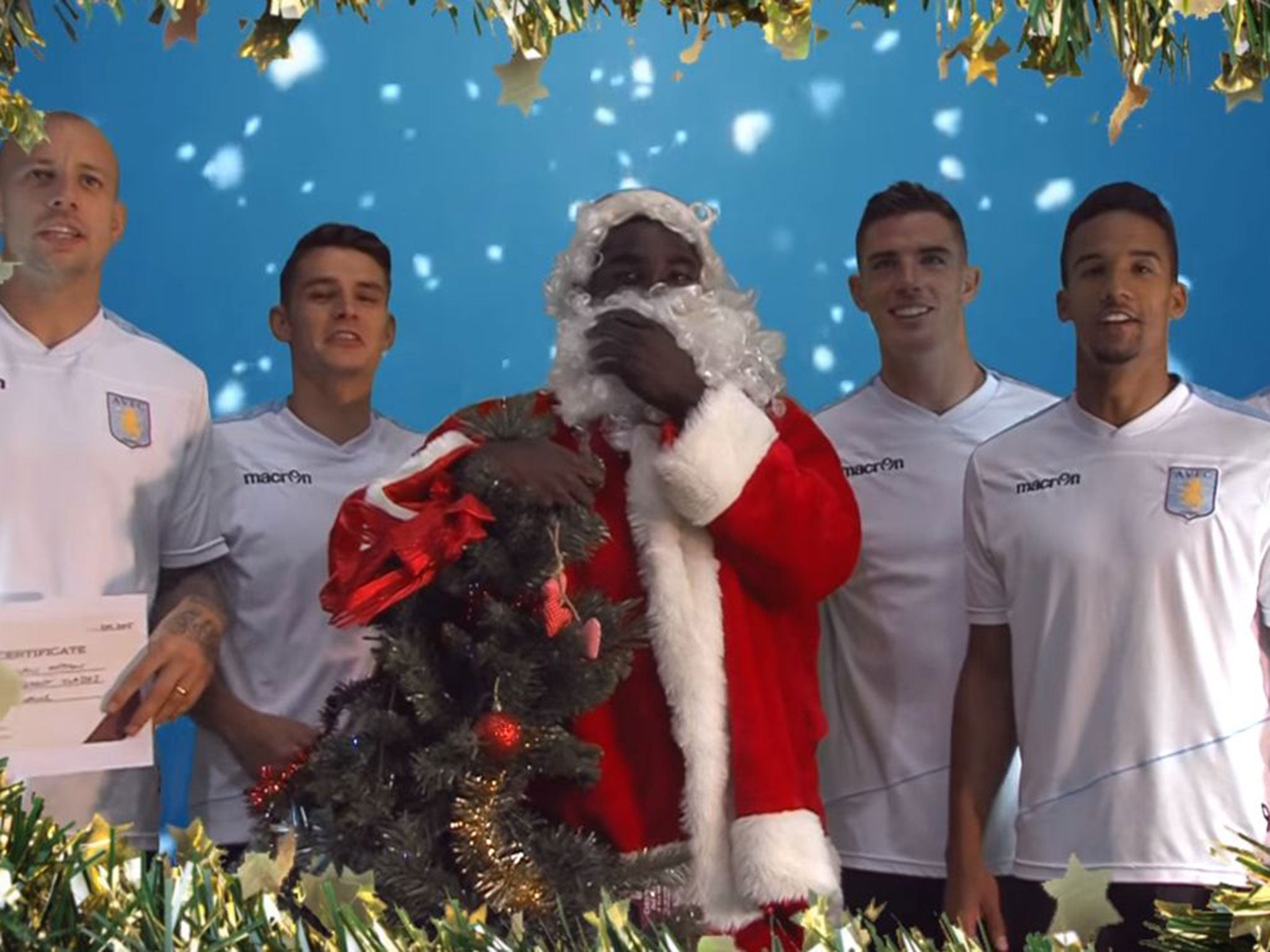 Micah Richards dressed up as Santa Claus alongside his Aston Villa team-mates