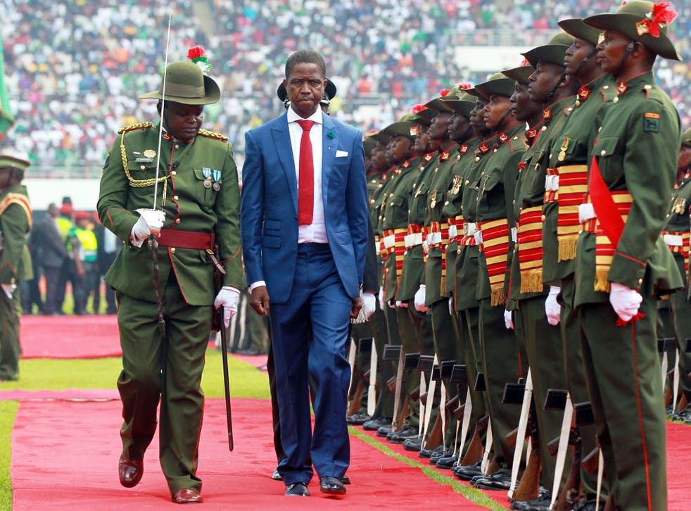 President Edgar Lungu reviews a guard of honour after being sworn in on 25 January, 2015 at the Heroes National Stadium in Lusaka
