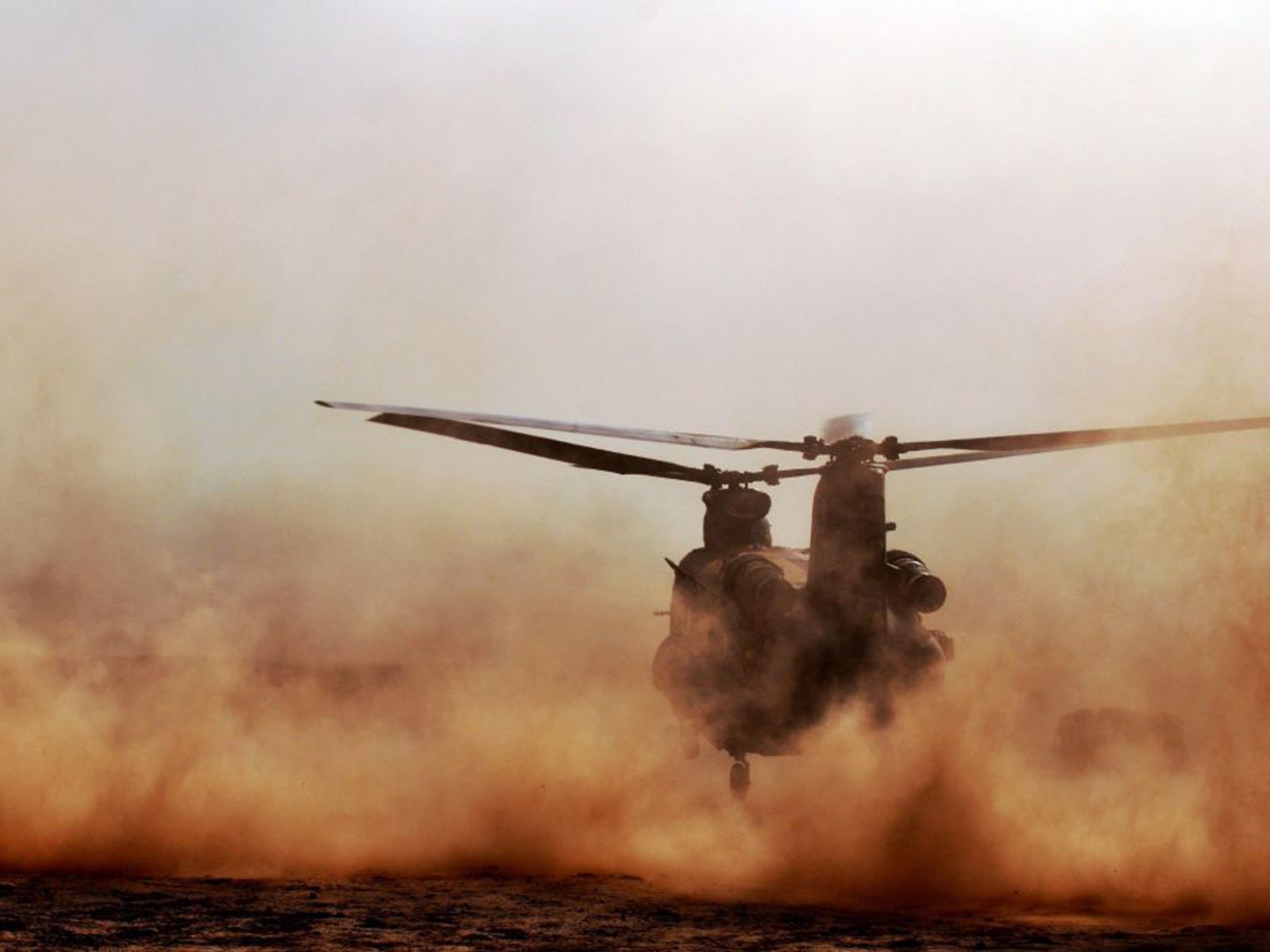 A British RAF Chinook helicoper, flying to Sangin, Afghanistan in 2010