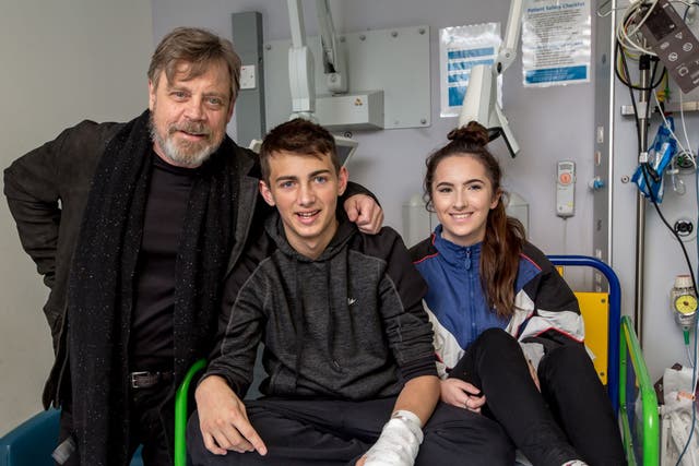 Mark Hamill, aka Luke Skywalker visits kids at Gt Ormond St Hospital. Pictured here with Coke Rayner 16 and friend Katie Leck 17