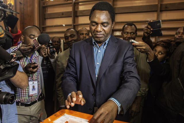 Opposition candidate Hakainde Hichilema, of the United Party for National Development (UPND) party, casts his ballot on January 20, 2015 in Lusaka.