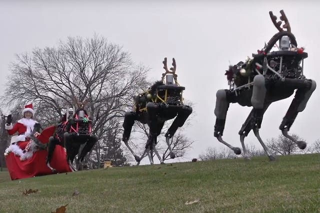 Boston Dynamics' Spot robots pulling Santa's sleigh