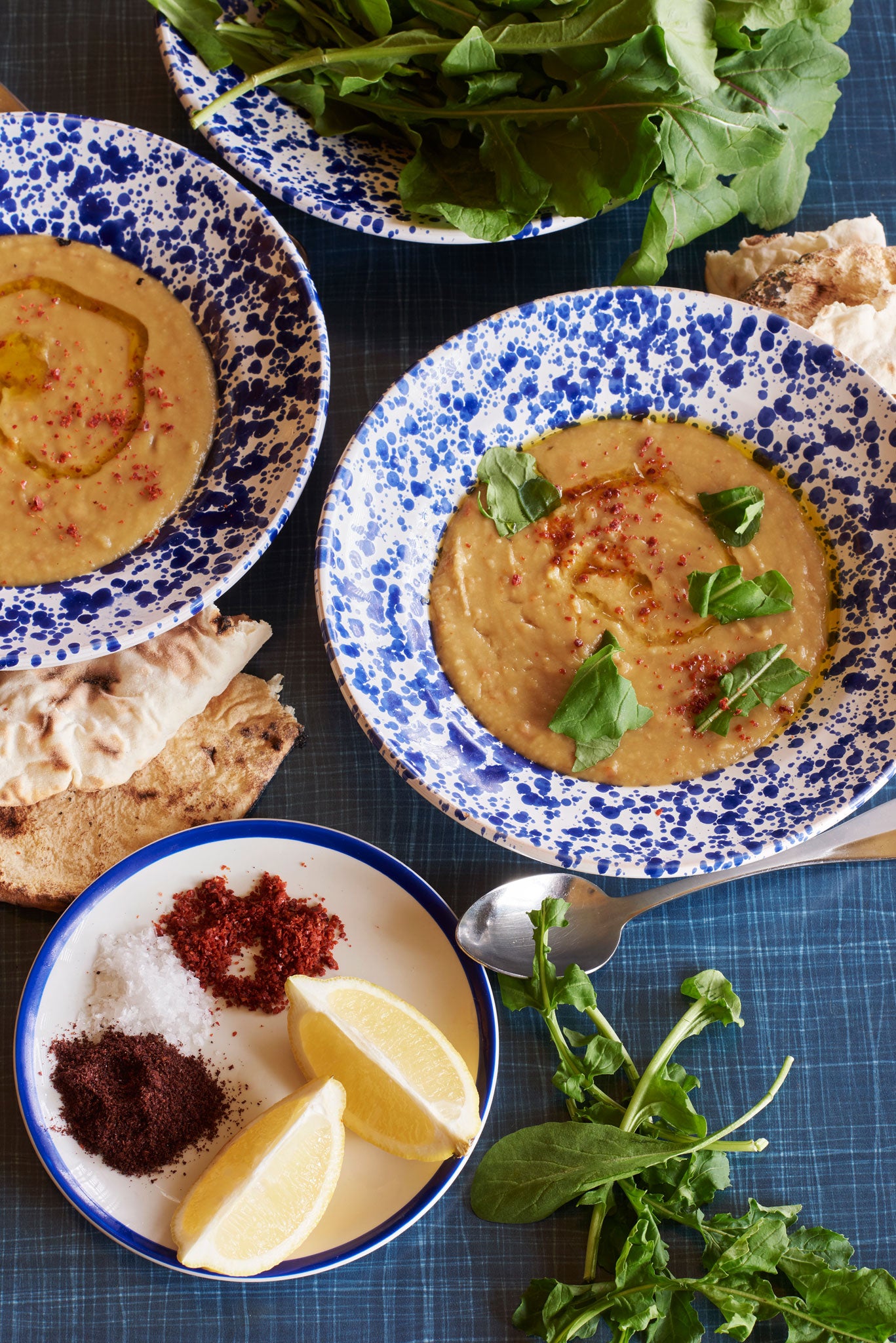 Corbasi soup served with flatbreads and lemon