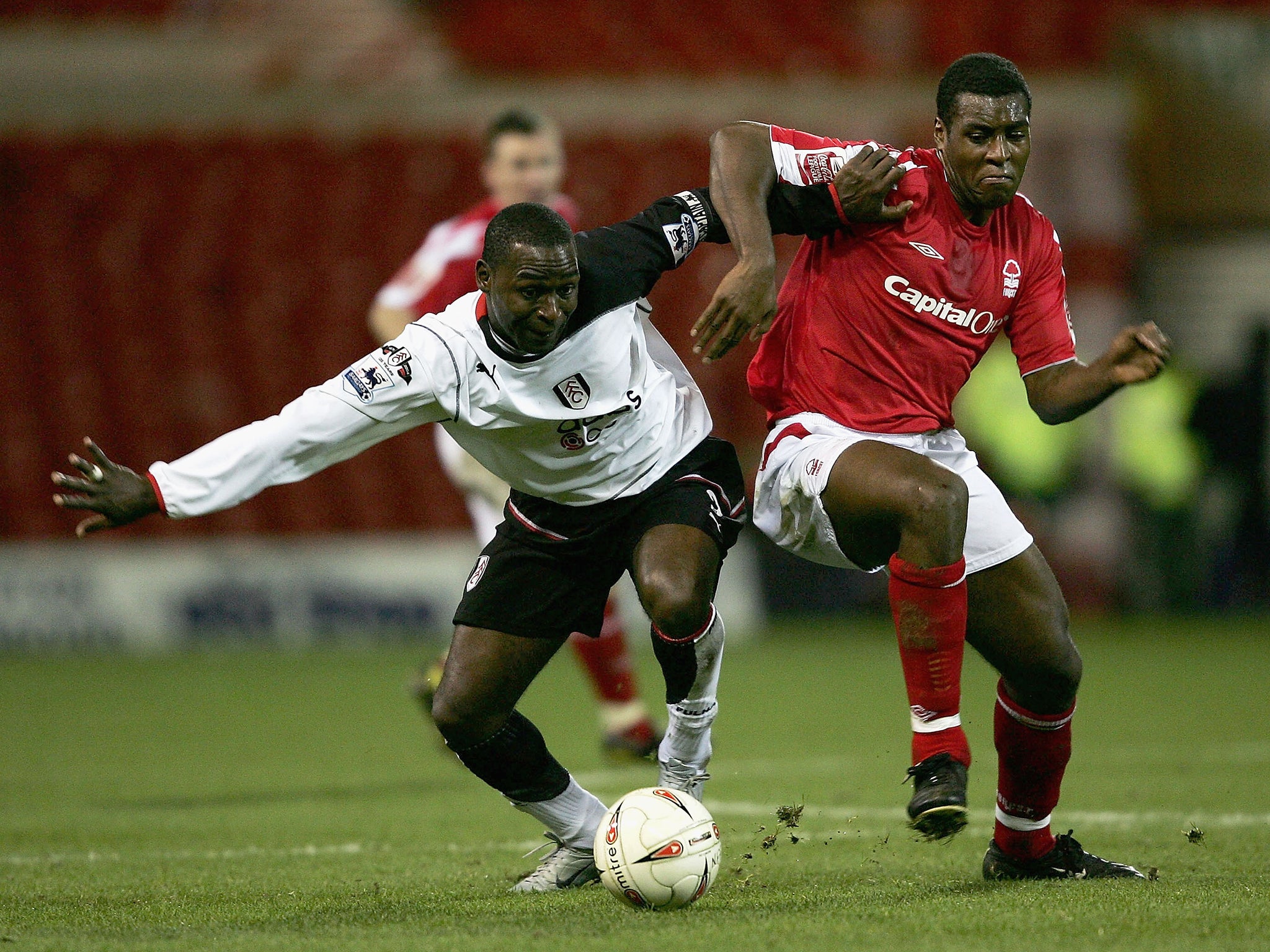 Morgan facing Andrew Cole in a League Cup game in November 2004