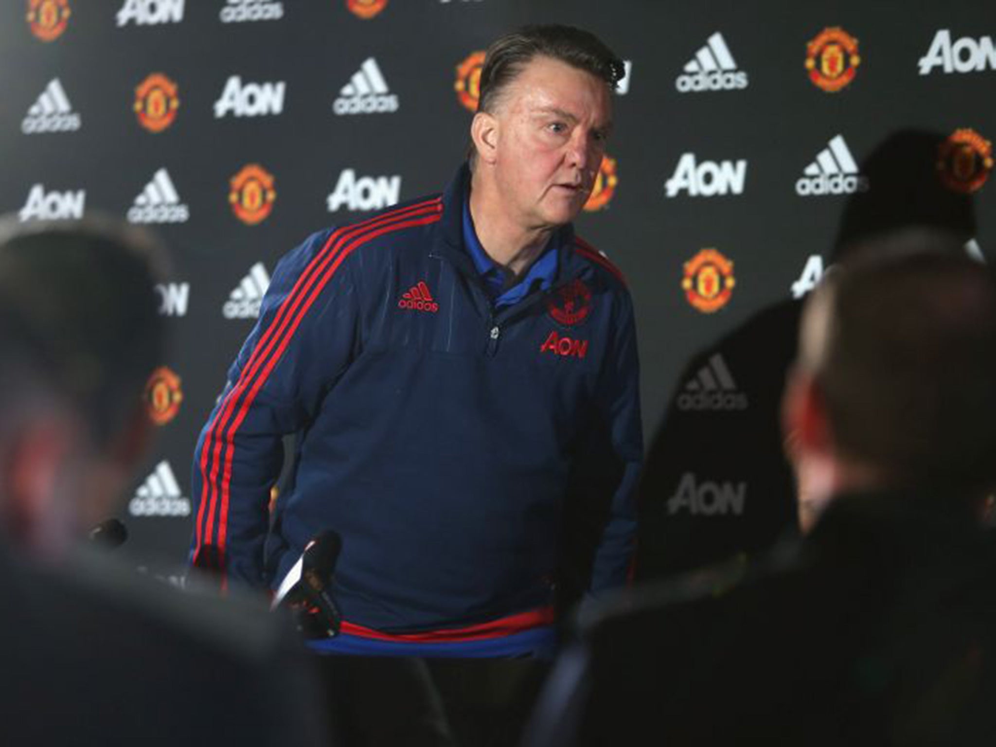 Louis van Gaal walks out of his press conference yesterday
