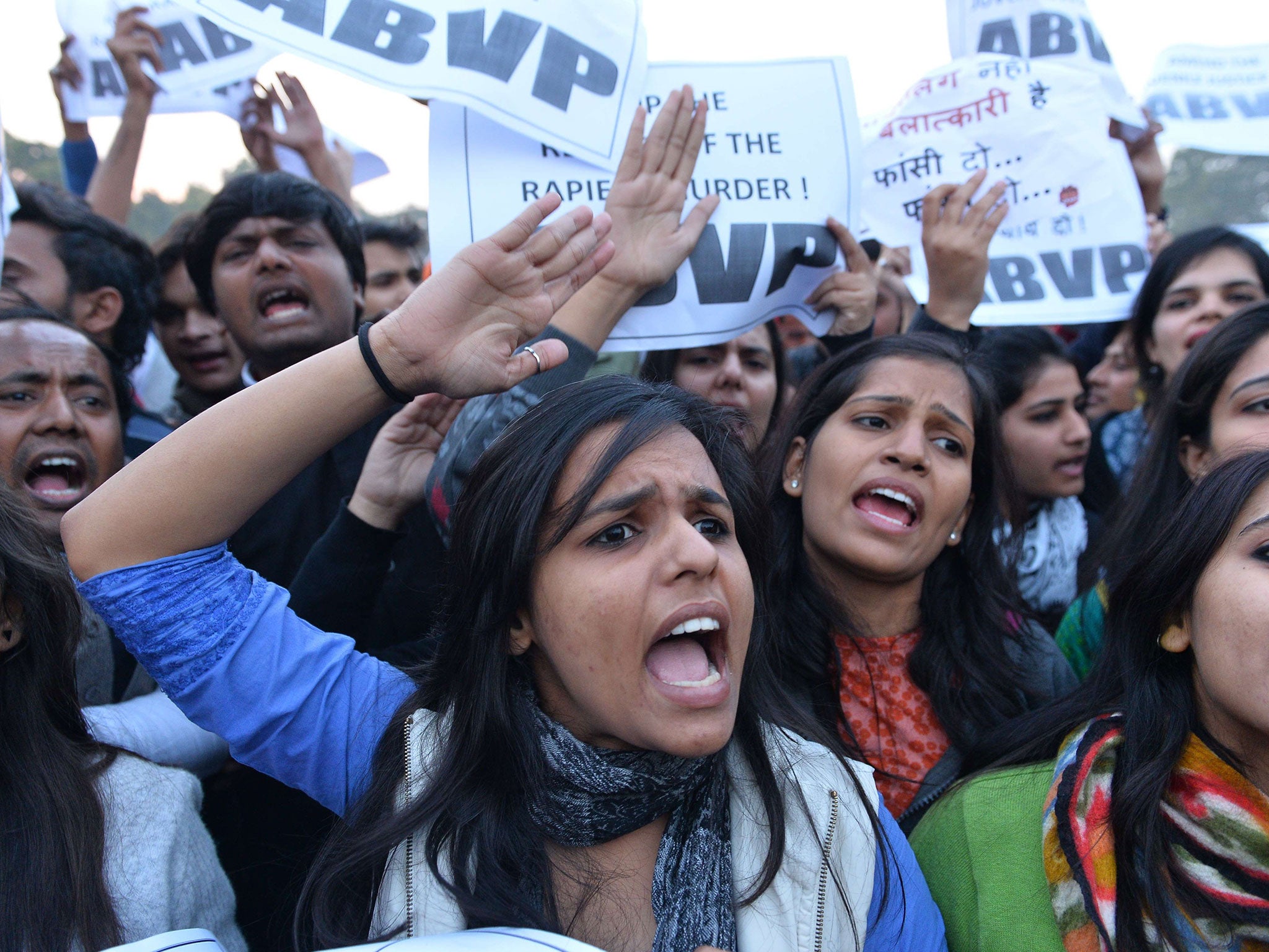 Indian demonstrators shout slogans during a rally in New Delhi held to protest the release of one of the Delhi bus rapists