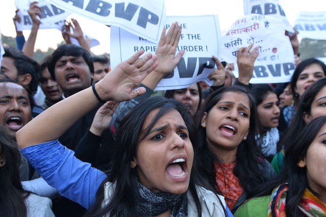 Indian demonstrators shout slogans during a rally in New Delhi held to protest the release of one of the Delhi bus rapists