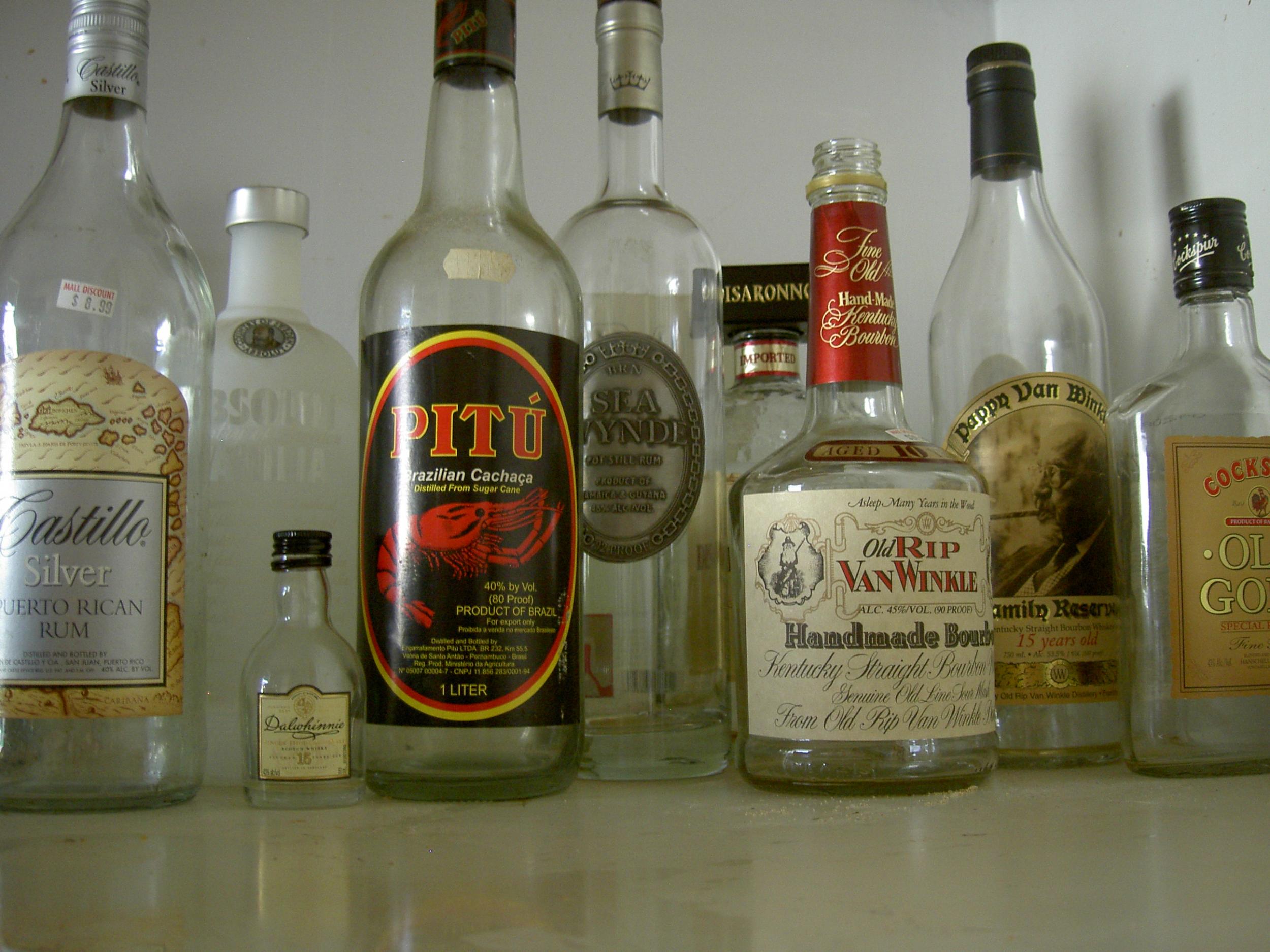 Empty spirit bottles on a shelf