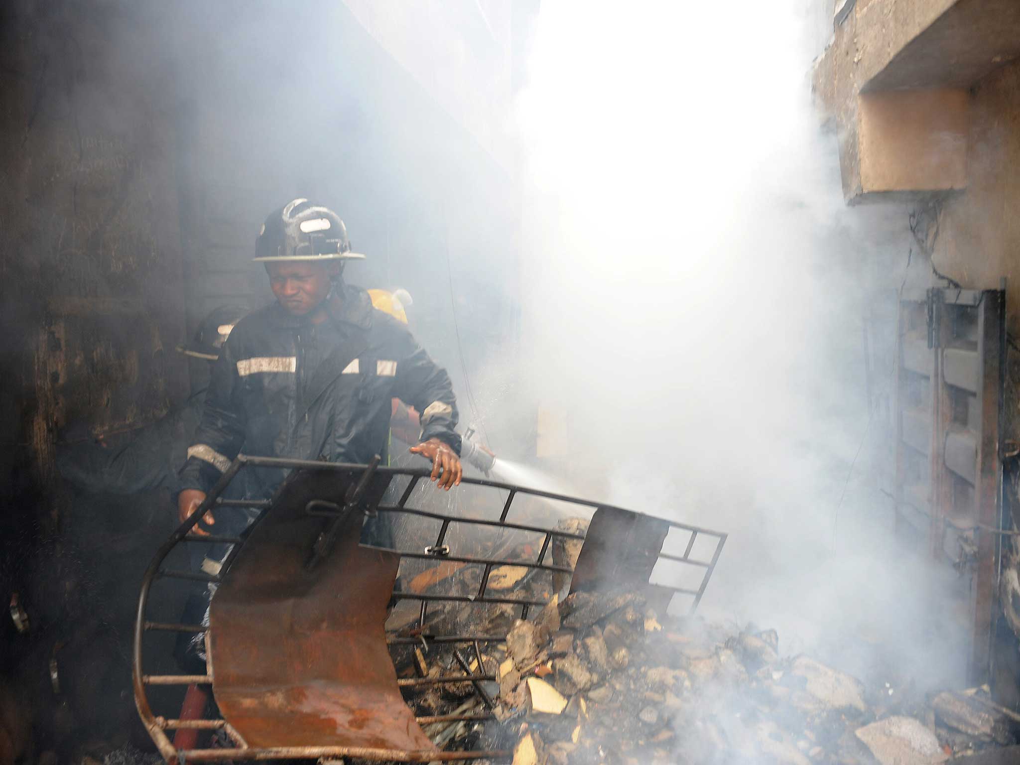 A Nigerian fireman deals with a blaze
