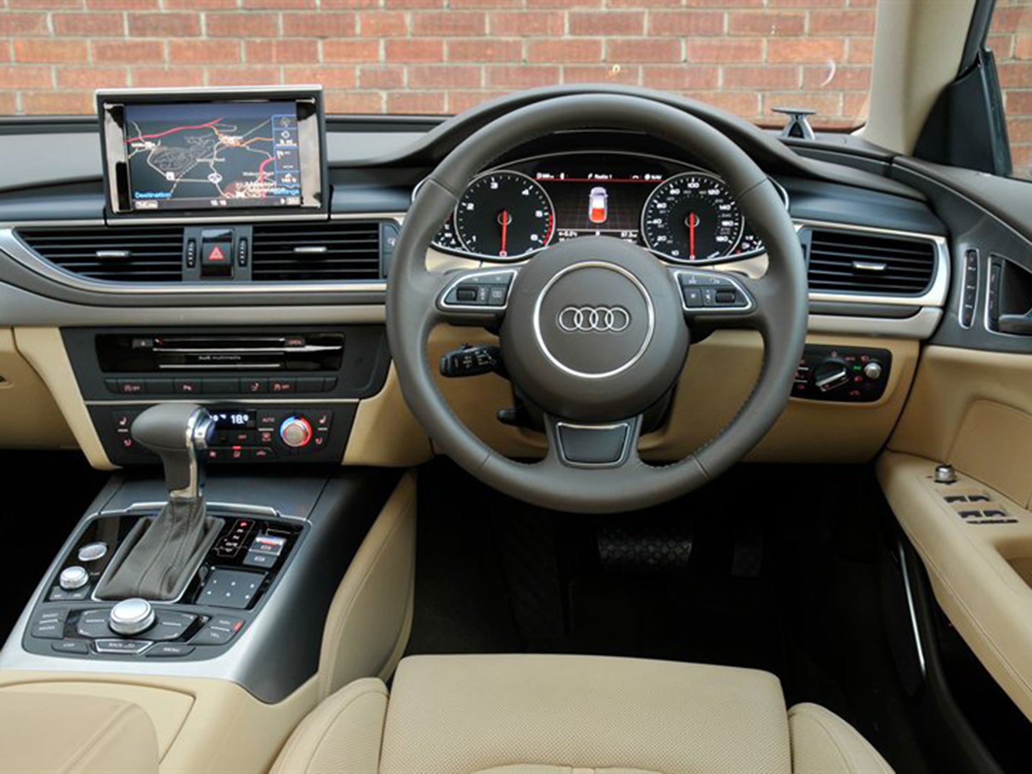 A comfortable driving position looks out over a high-quality, well detailed dash