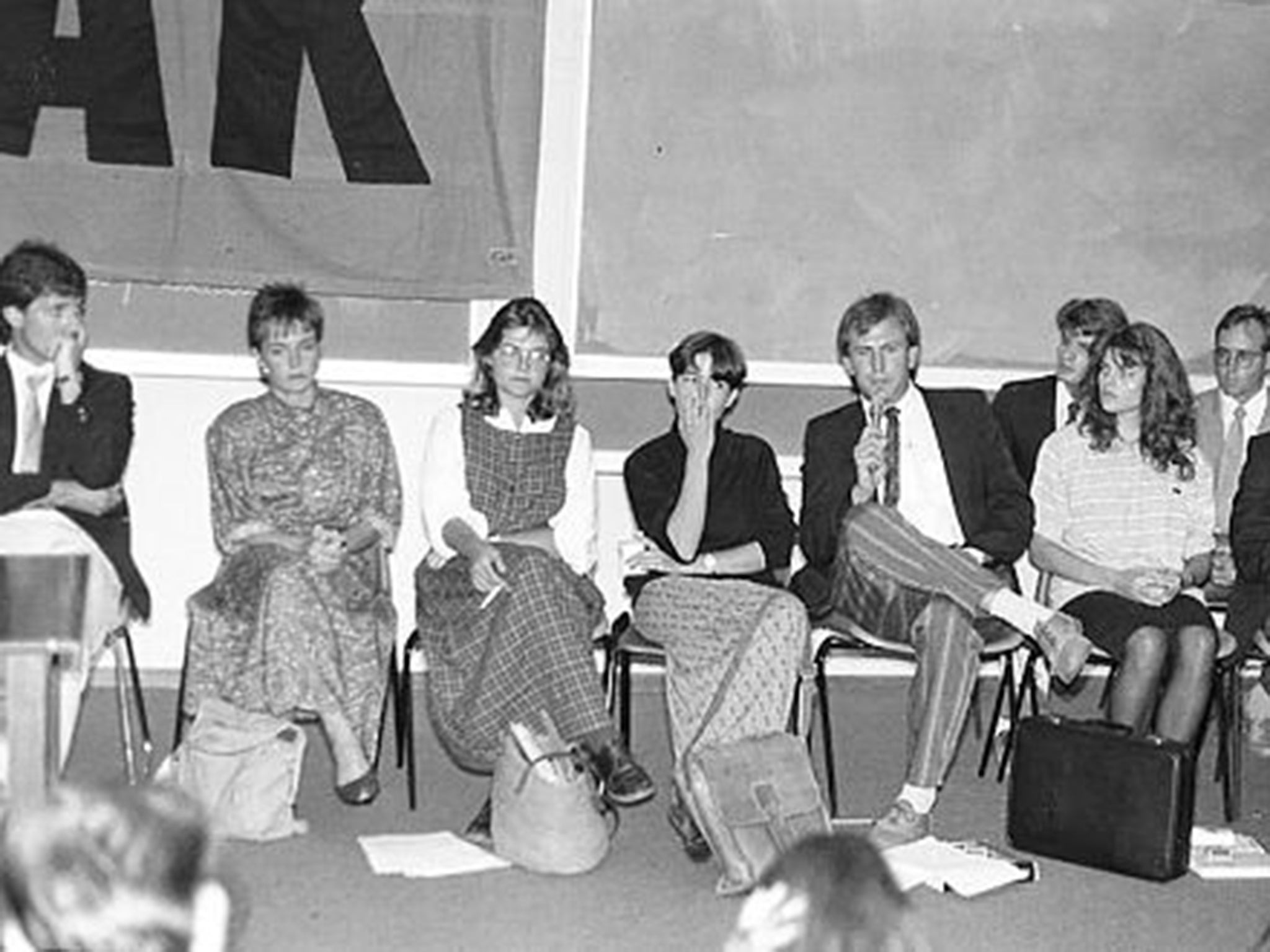 Behr, with microphone, at a conference in Lusaka in 1989; his friend Pearlie Joubert is third from the left
