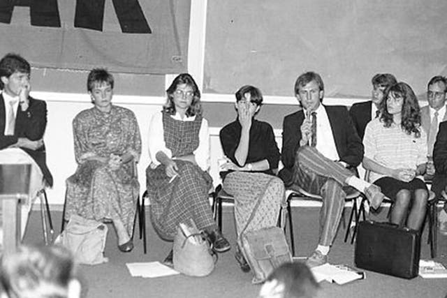 Behr, with microphone, at a conference in Lusaka in 1989; his friend Pearlie Joubert is third from the left